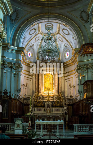 Three church candlesticks on altar candle stands inside the Church of Santa  Maria Assunta, Positano, Amalfi Coast, Campania, Italy Stock Photo - Alamy