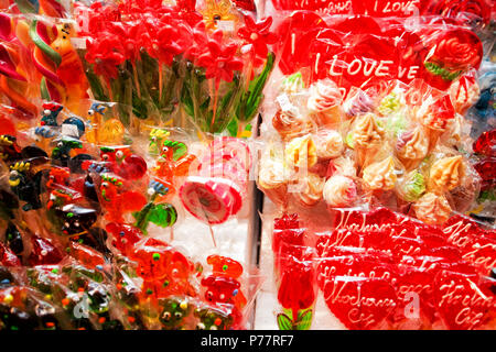 colorful lollipops suckers displayed for sale Stock Photo