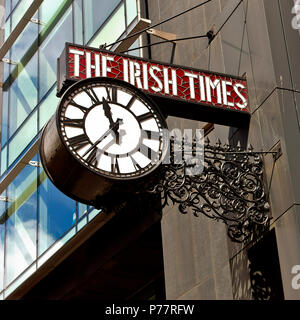 The Irish Times newspaper building headquarters. Clock and leaded glass sign. Dublin, Republic of Ireland, Europe, EU. Stock Photo