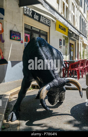 Arles, France - June 16th, 2018: Fake bull on the streets of Arles, famous for its bullring in the arena held twice a year during Feria d'Arles Stock Photo