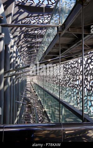 Marseille, MuCEM, View of the public pedestrian ramp between the outer latticework shell & the building itself, linking all floors Stock Photo