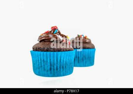 Two Chocolate cupcakes isolated on white background Stock Photo