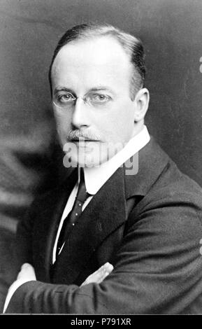 Dr. Jos. Fischer, half-length portrait, arms crossed over chest, facing left 1900-1920 Stock Photo