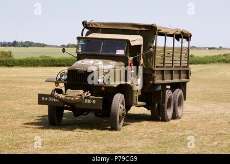 WW2 U.S. Army GMC CCKW 2½-ton 6x6 cargo truck with winch and machine ...