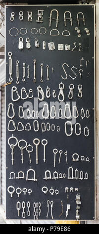 Carabiners and Hooks in Hardware Shop Stock Photo