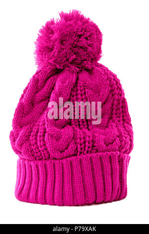 Pink bobble hat or knit hat isolated against a white background. Stock Photo