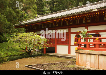 The Byodo-In Temple. A replica of the Byodo-In Temple built over 950 years ago at Uji, Japan. A Buddhist temple open to tourists. Valley of the Temple Stock Photo