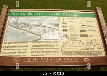 Sign at Puu O Mahuka Heiau State Historic Site - Hill Of Escape. A Sacred Place of the Gods. A bluff overlooking Waimea Bay and Waimea Valley. Oahu Is Stock Photo