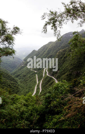 Santa Catarina, Brazil. Panoramic view of mountain road curves in a cloudy day.
