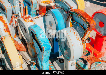 Old rusty food scales. Multicolored textures of rusty metal. Stock Photo