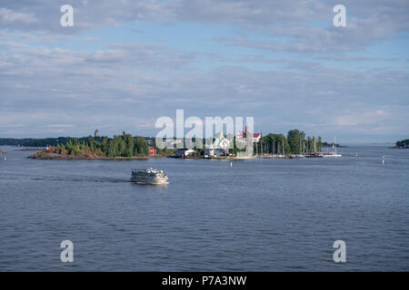 HELSINKI, FINLAND - 25/6/2018: Tourist boat arriving at Helsinki harbour with Valkosaari island in the background Stock Photo