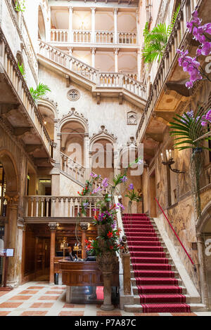 Interior main staircase of the historic  luxury 5 star Hotel Danieli, Castello, Venice,  Veneto, Italy in Byzantine Gothic style. Previously the Pala Stock Photo