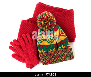 Winter hat, scarf and gloves isolated against a white background. Stock Photo