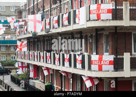 London UK. 5th July 2018. Residents at the Kirby housing estate in Bermondsey East London  decorate their properties  with St George flags and bunting as a show support for the England team at the FIFA World Cup as  England play their Quarterfinal match against Sweden  on Saturday 7 July Credit: amer ghazzal/Alamy Live News Stock Photo