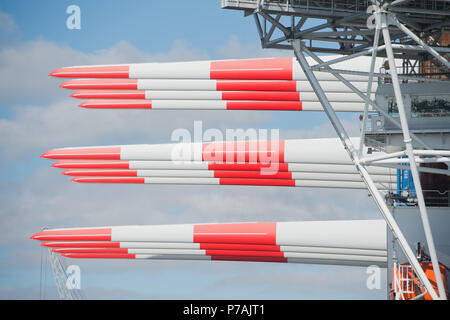 Sassnitz, Germany. 02nd July, 2018. The wind turbine installation vessel SEA CHALLENGER heads out from Mukran Port laden with parts for the Arkona offshore wind farm. Credit: Stefan Sauer/dpa-Zentralbild/dpa/Alamy Live News Stock Photo