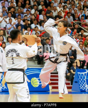 Inter-Korean friendly basketball match, July 5, 2018 : Members of North Korea's taekwondo demonstration team demonstrate at halftime of inter-Korean men's friendly basketball match at Ryugyong Chung Ju-yung Gymnasium in Pyongyang, North Korea. The 100-strong South Korean delegation of athletes, coaches, government officials and journalists arrived in Pyongyang on July 3 for the matches which have not been held in 15 years. Credit: Press Pool in Pyeongyang/AFLO/Alamy Live News Stock Photo