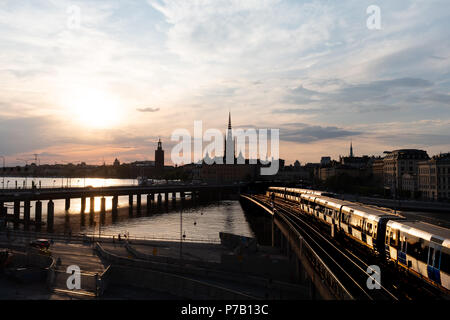 Stockholm waterfront and Riddarholm Church, seen from Sodermalm, Stockholm, Sweden at sunset Stock Photo