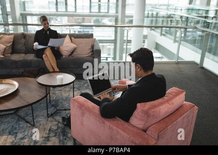 Businesspeople working in the office Stock Photo