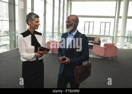Businesspeople discussing in the office Stock Photo