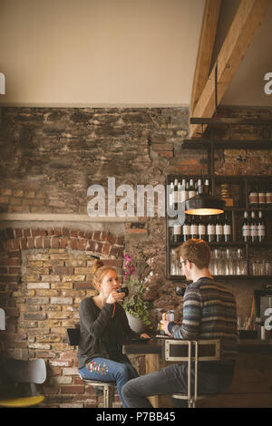 Couple having coffee at bar counter Stock Photo