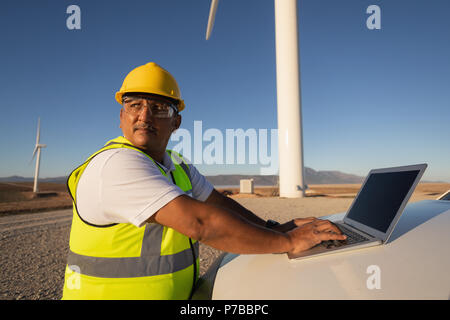 Engineer using a laptop Stock Photo