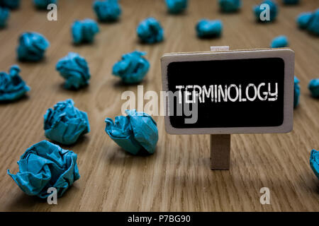 Writing note showing Terminology. Business photo showcasing Collection of terms used by different profession study industry Cyan paper imagination ide Stock Photo