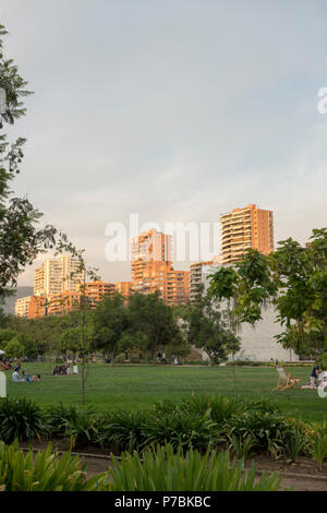 Bicentenario Park, with the affluent apartment buildings of Vitacura in the background, Santiago Stock Photo