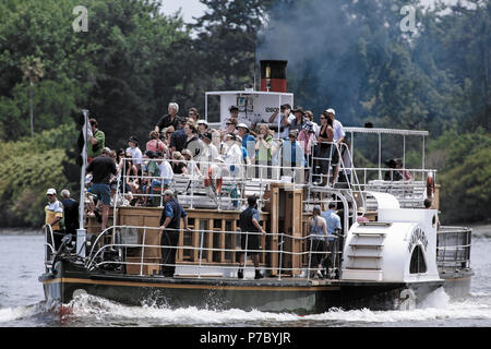 Passengers aboard the Waimarie paddle steamer on the Whanganui river, New Zealand Stock Photo