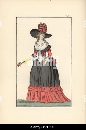 Woman in large black felt hat with a poppy-red ribbon, caraco jacket, violet corset, and black and poppy petticoats, white fichu and falbala, 1787. Handcoloured lithograph from Fashions and Customs of Marie Antoinette and her Times, by Le Comte de Reiset, Paris, 1885. The journal of Madame Eloffe, dressmaker and linen-merchant to the Queen and ladies of the court. Stock Photo