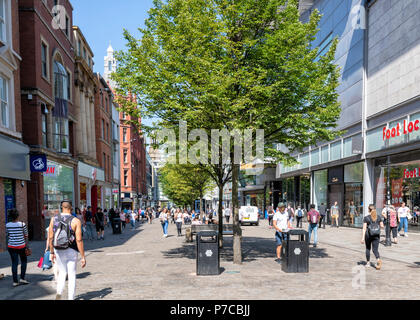 Shoppers walking along Market Street in the centre of Manchester, UK Stock Photo