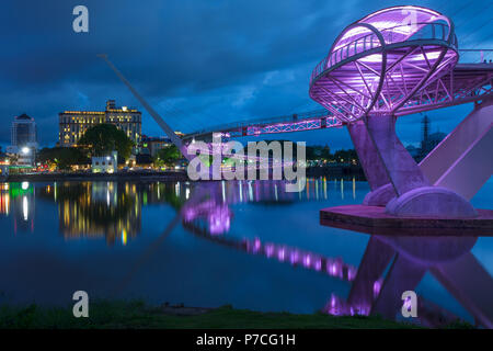 Darul Hana Bridge (Jambatan Darul Hana) is best known as the golden bridge built across the Sarawak river. Stock Photo