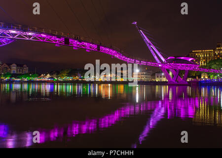 Darul Hana Bridge (Jambatan Darul Hana) is best known as the golden bridge built across the Sarawak river. Stock Photo