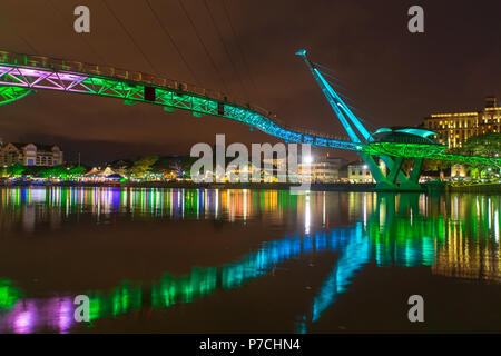 Darul Hana Bridge (Jambatan Darul Hana) is best known as the golden bridge built across the Sarawak river. Stock Photo