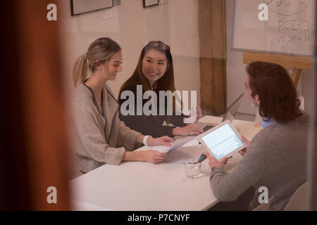 Business colleagues having discussion in meeting Stock Photo