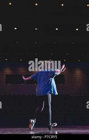 Woman dancing on stage Stock Photo