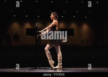 Ballet dancer dancing on stage Stock Photo