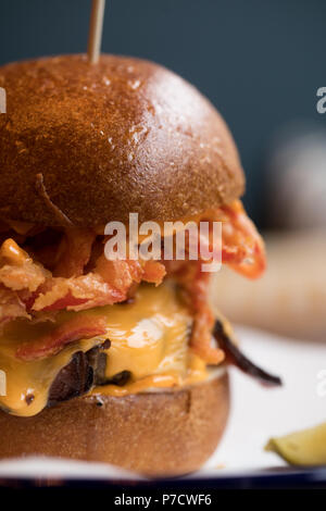 Burger served in a restaurant Stock Photo