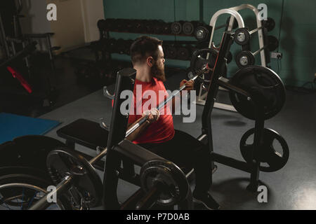 Handicapped man ready to lift barbell Stock Photo
