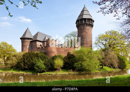 Linn moated castle in spring, Krefeld, Lower Rhine, North Rhine-Westphalia, Germany Stock Photo