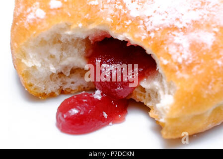 jam doughnut on white plate Stock Photo