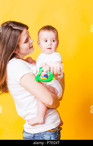 The baby gives a good mood Stock Photo