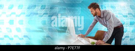 Man using computer with geometric transitions Stock Photo