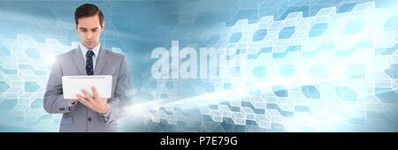 Man using tablet with geometric transitions Stock Photo