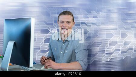 Man using computer with geometric transition Stock Photo