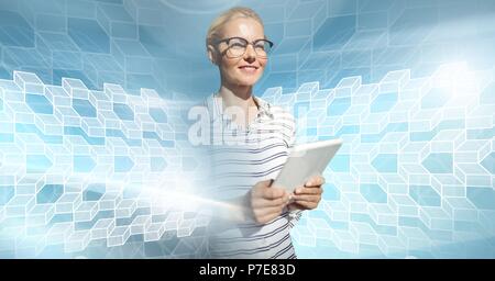Woman using tablet with geometric transition Stock Photo