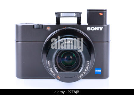 Advanced compact camera Sony DSC-RX100 M5 isolated on white. One