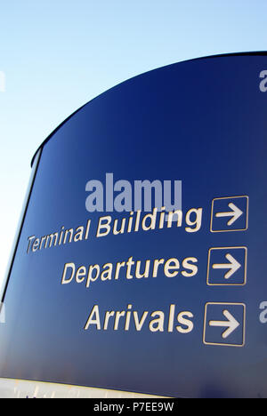 Blue advice signs outside the main doors at Doncaster Sheffield Airport, formerly named Robin Hood Airport Doncaster Sheffield, Stock Photo