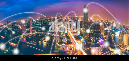 Panorama view of Bangkok city at dark night, Network connection concept Stock Photo