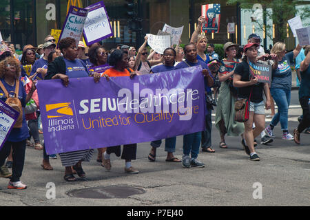 CHICAGO, ILLINOIS USA - JUNE 30, 2018: Service Employees International Union members march at the Families Belong Together rally. Stock Photo