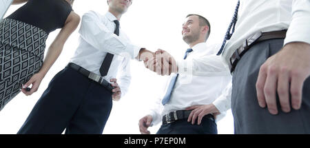 handshake business colleagues after discussing the new presentation. Stock Photo